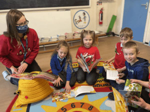 UWTSD representative Mared Anthomy with children at Blaenymaes Primary School 3