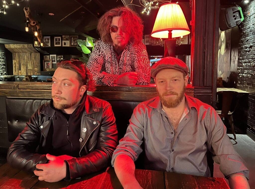 L to R: Marc Zolla (Guitar/Vocals), Michel Paradis (Drums), John Burton (Bass)